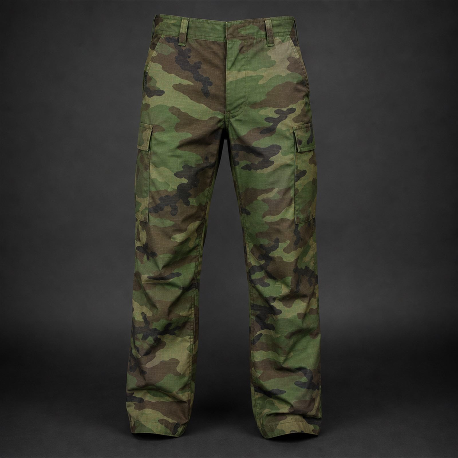 Hot weather tactical pants with lightweight quick dry shell, mesh ventilation panels and reinforced knee